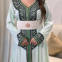 Caftan رُقيّ